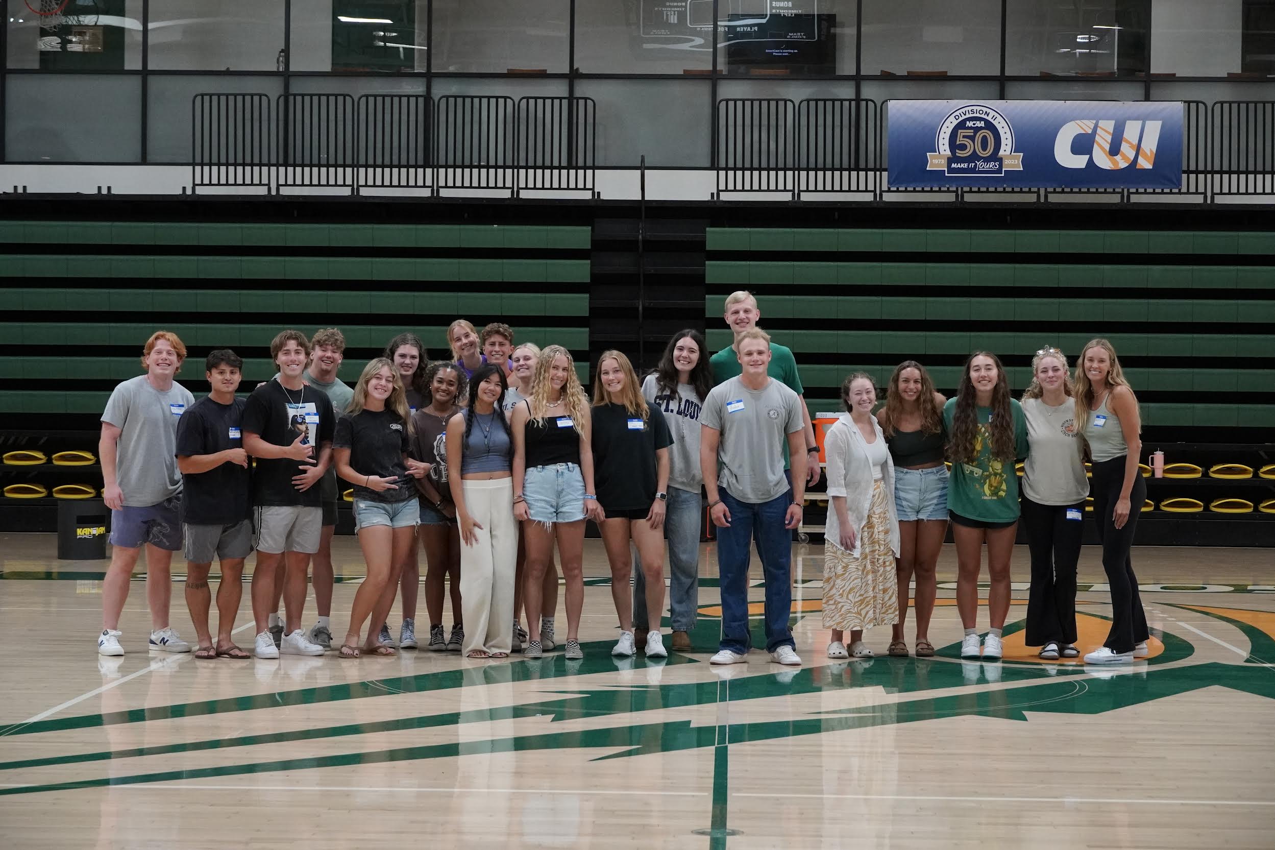 Athlete Bible Study leaders and attendees pose for a group photo